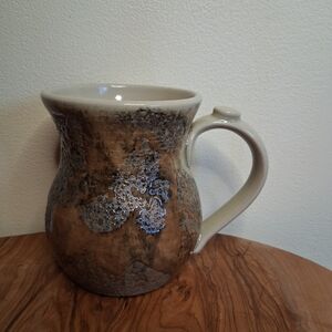 Handcrafted Ceramic Mug with Earthy Tones